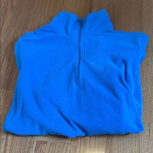A blue Gap pullover